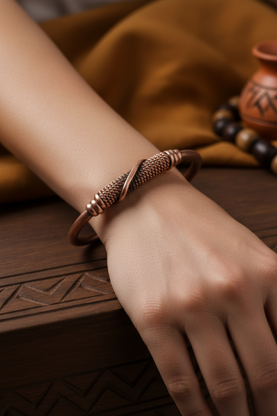 Model wearing African copper bracelet close-up