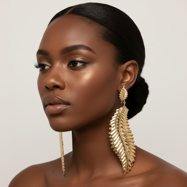 Model wearing gold hip-hop leaf earrings