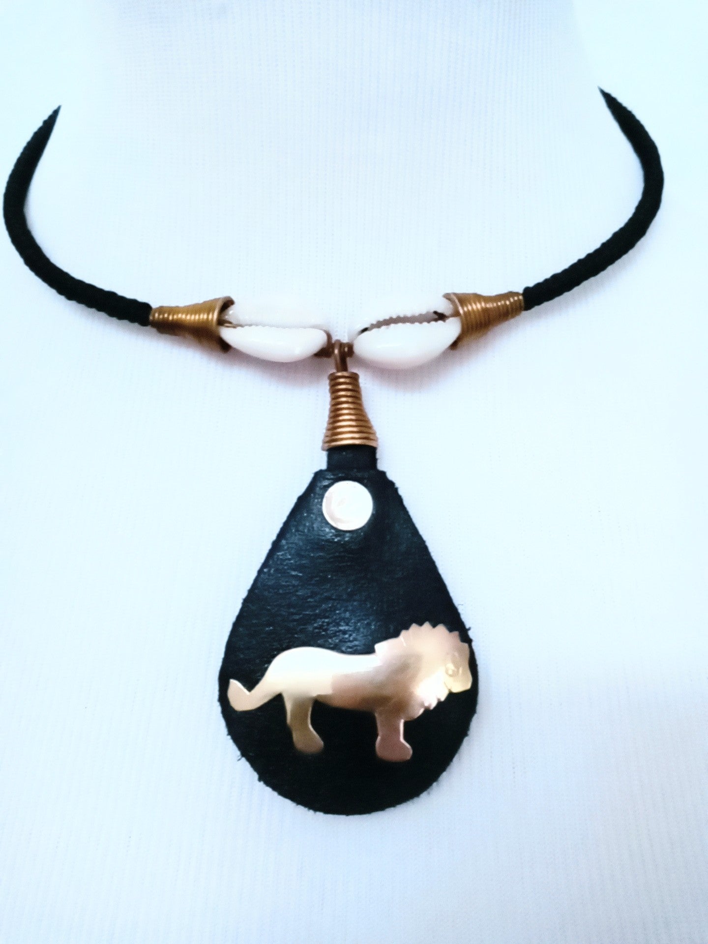 Hodari  handmade Pendant Leather Brass & Cowrie Shell
