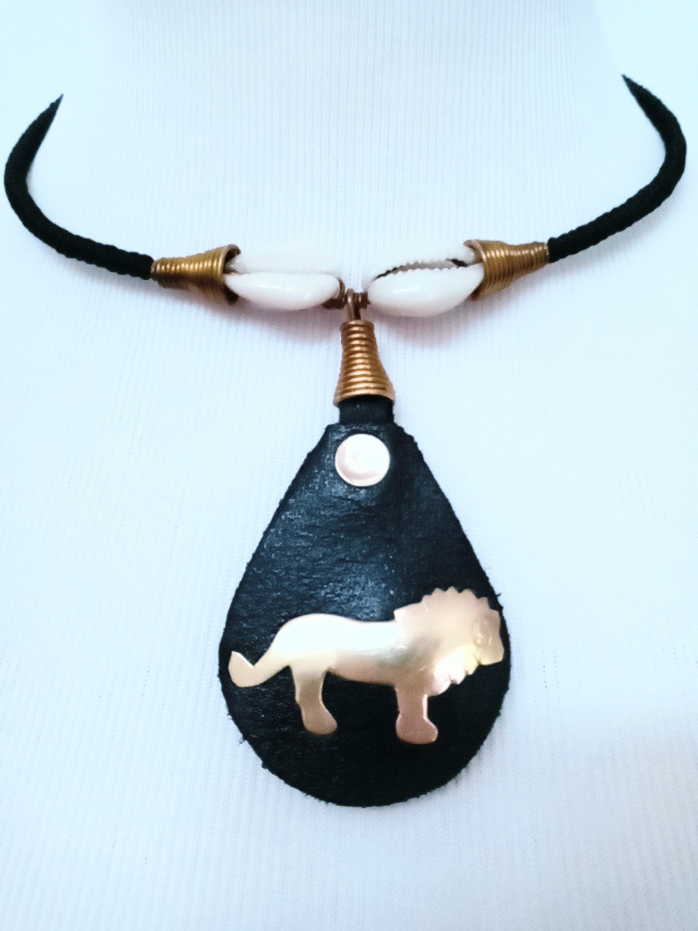 Hodari  handmade Pendant Leather Brass & Cowrie Shell