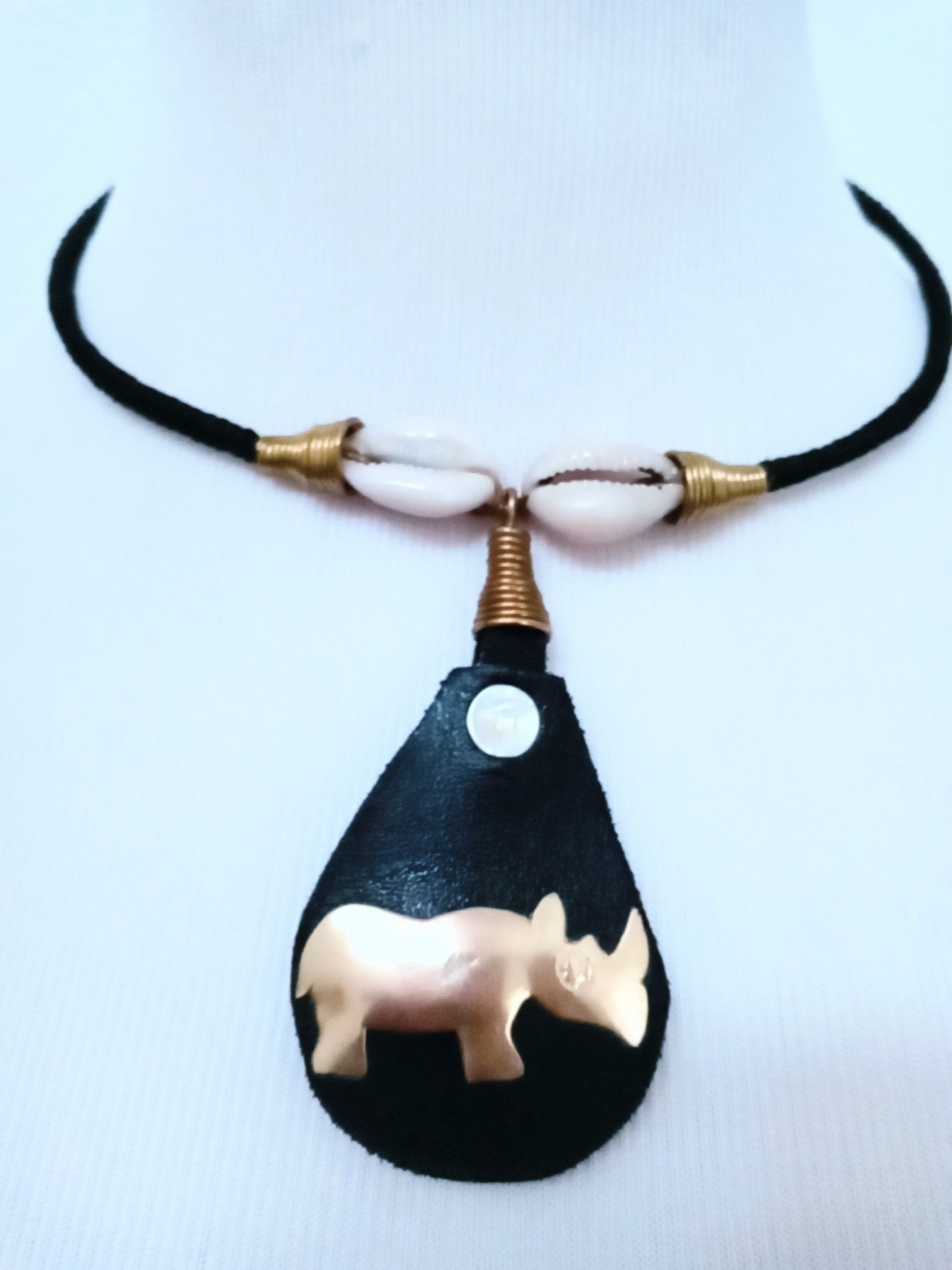 Hodari  handmade Pendant Leather Brass & Cowrie Shell