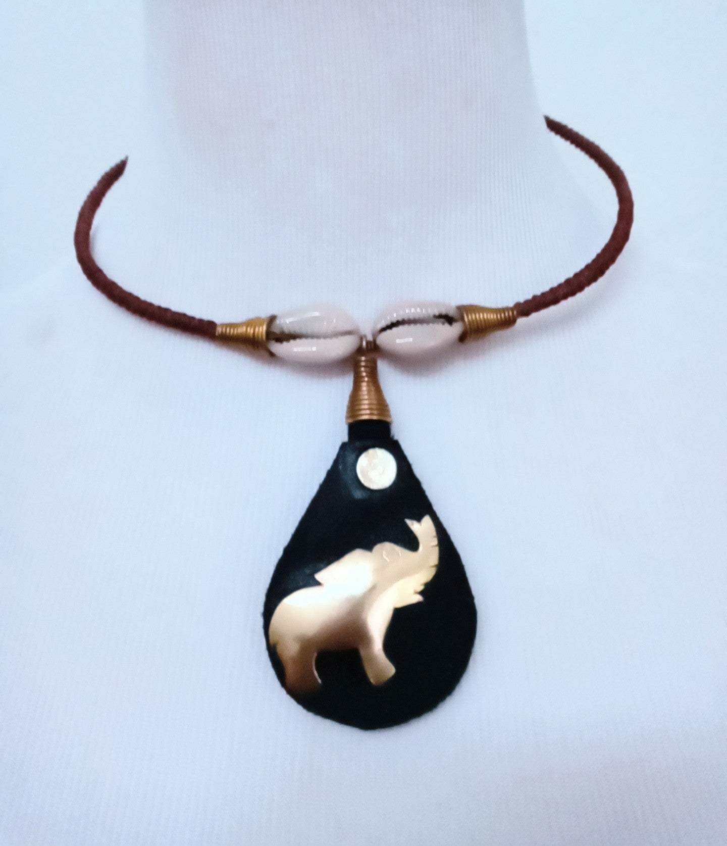 Hodari  handmade Pendant Leather Brass & Cowrie Shell