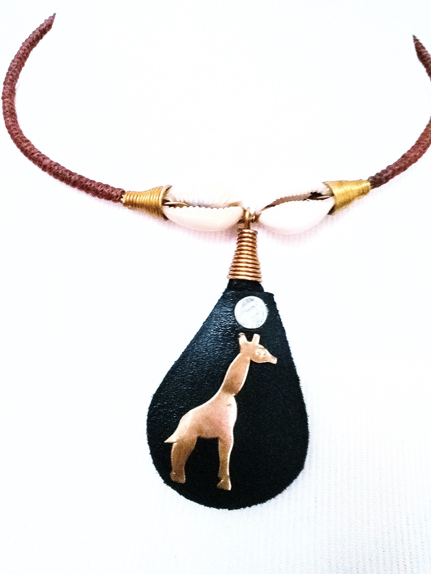 Hodari  handmade Pendant Leather Brass & Cowrie Shell