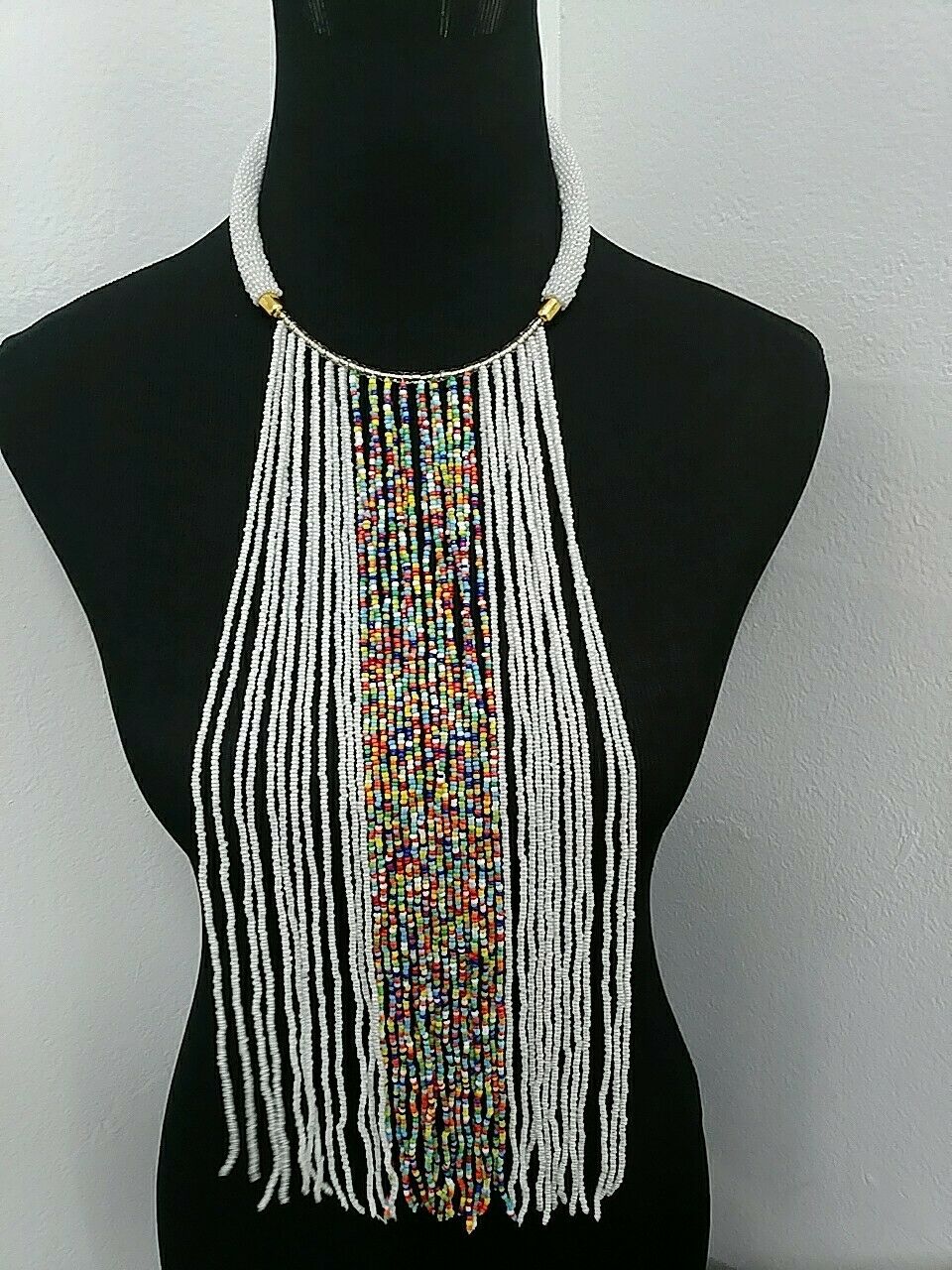 African artisan waterfall necklace worn as statement piece